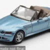 BMW Z3 with GoldenEye Poster (EN), hellblau, 1995, James Bond 007 – GoldenEye, 1:64, Mini GT