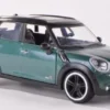 Mini Cooper S Countryman, dunkelgrün/schwarz, 1:24, Motormax