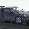 Porsche Cayman GT4 RS, dunkelblau, 2021, 1:43, Minichamps